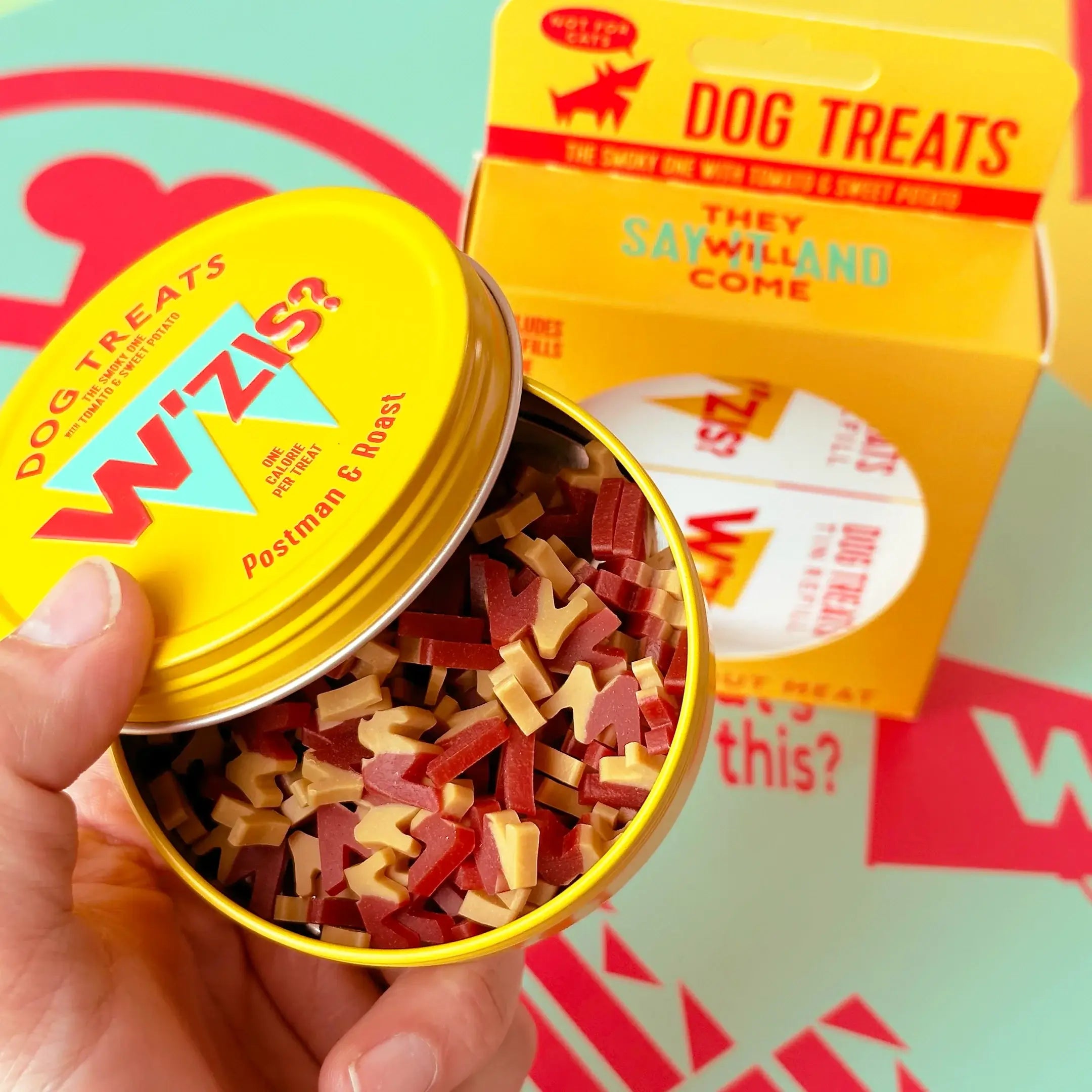 Close up of our Postman & Roast Tin with low-calorie dog treats