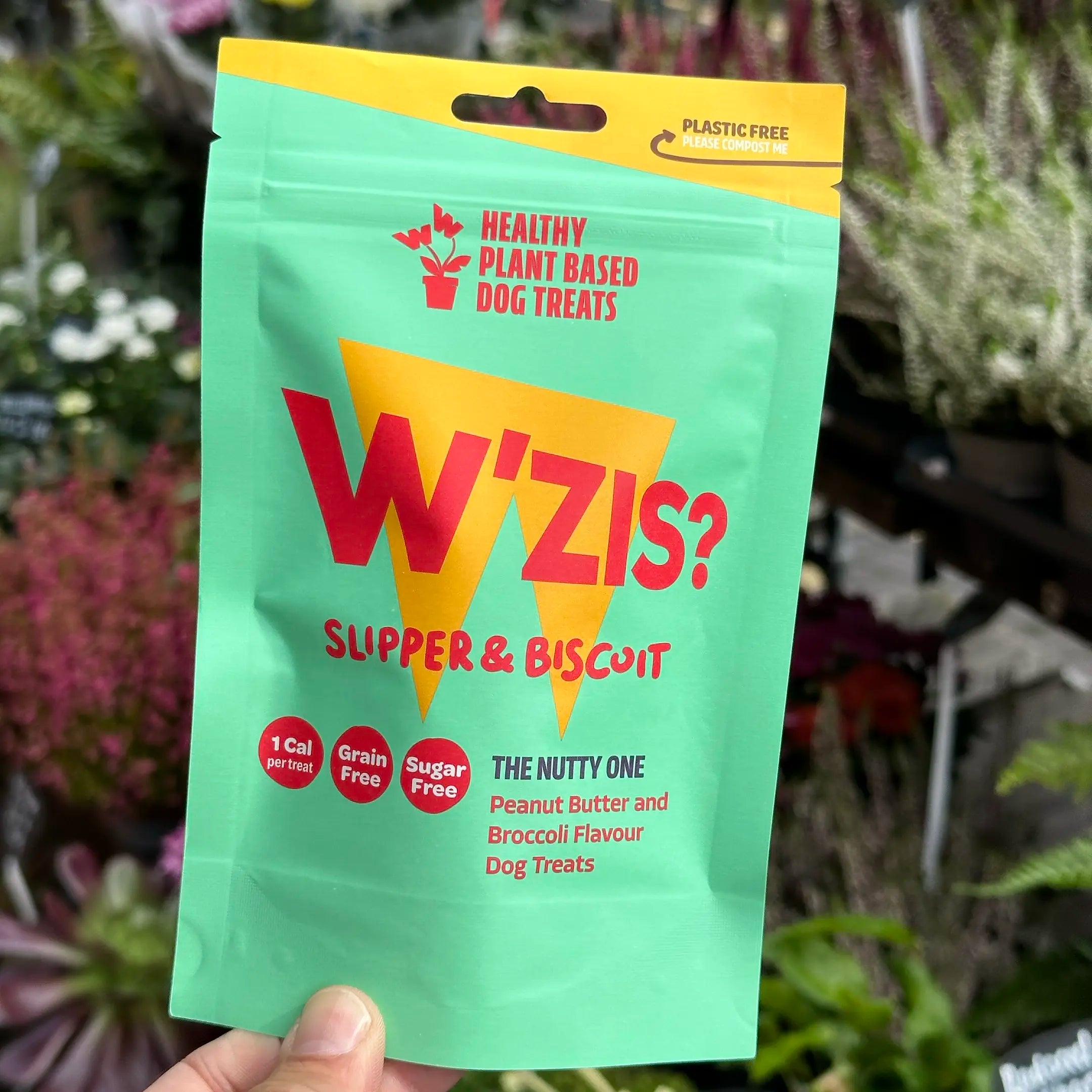 W’ZIS Slipper & Biscuit dog treats outside